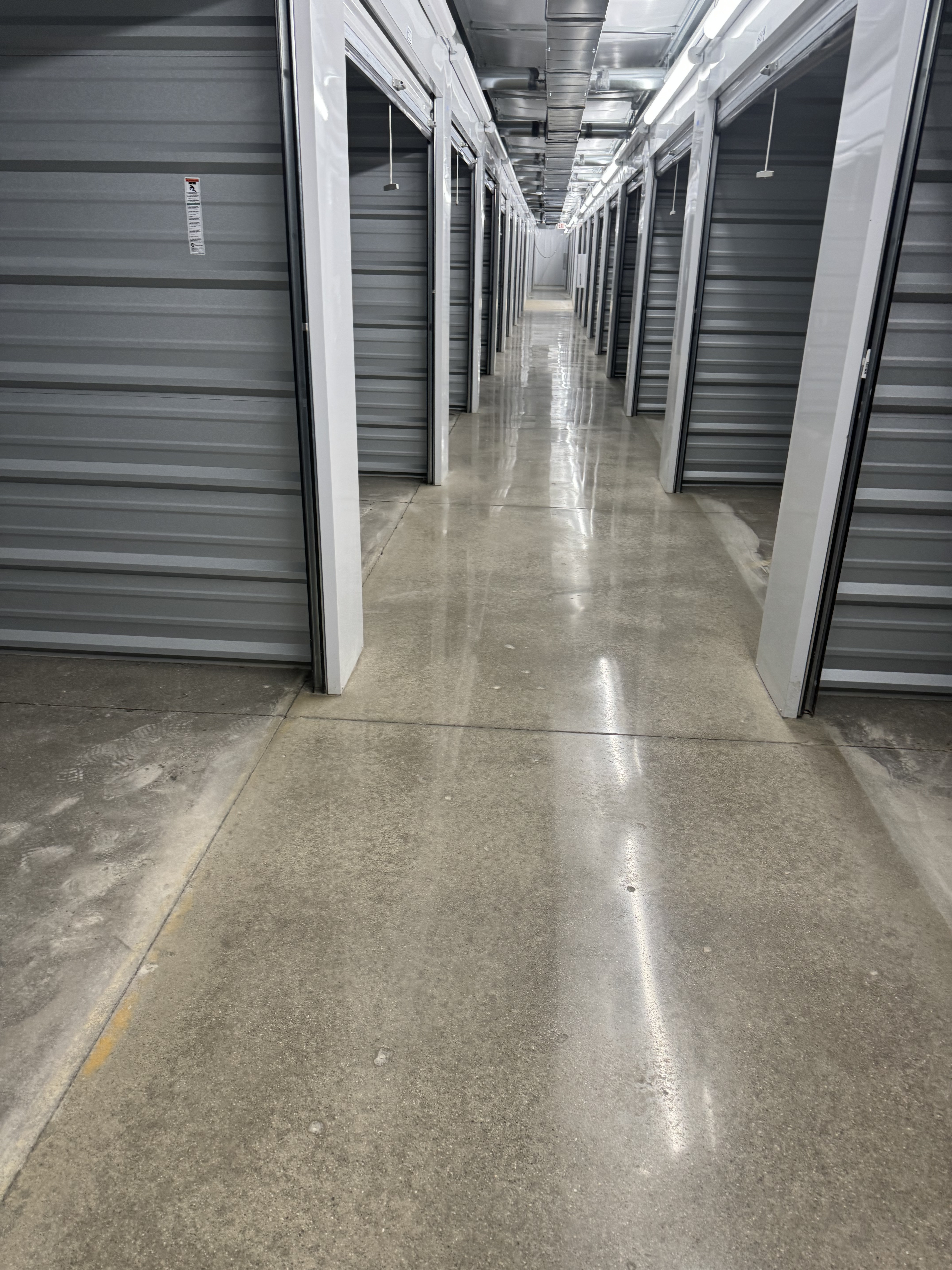 Epoxy flooring in a storage unit hallway